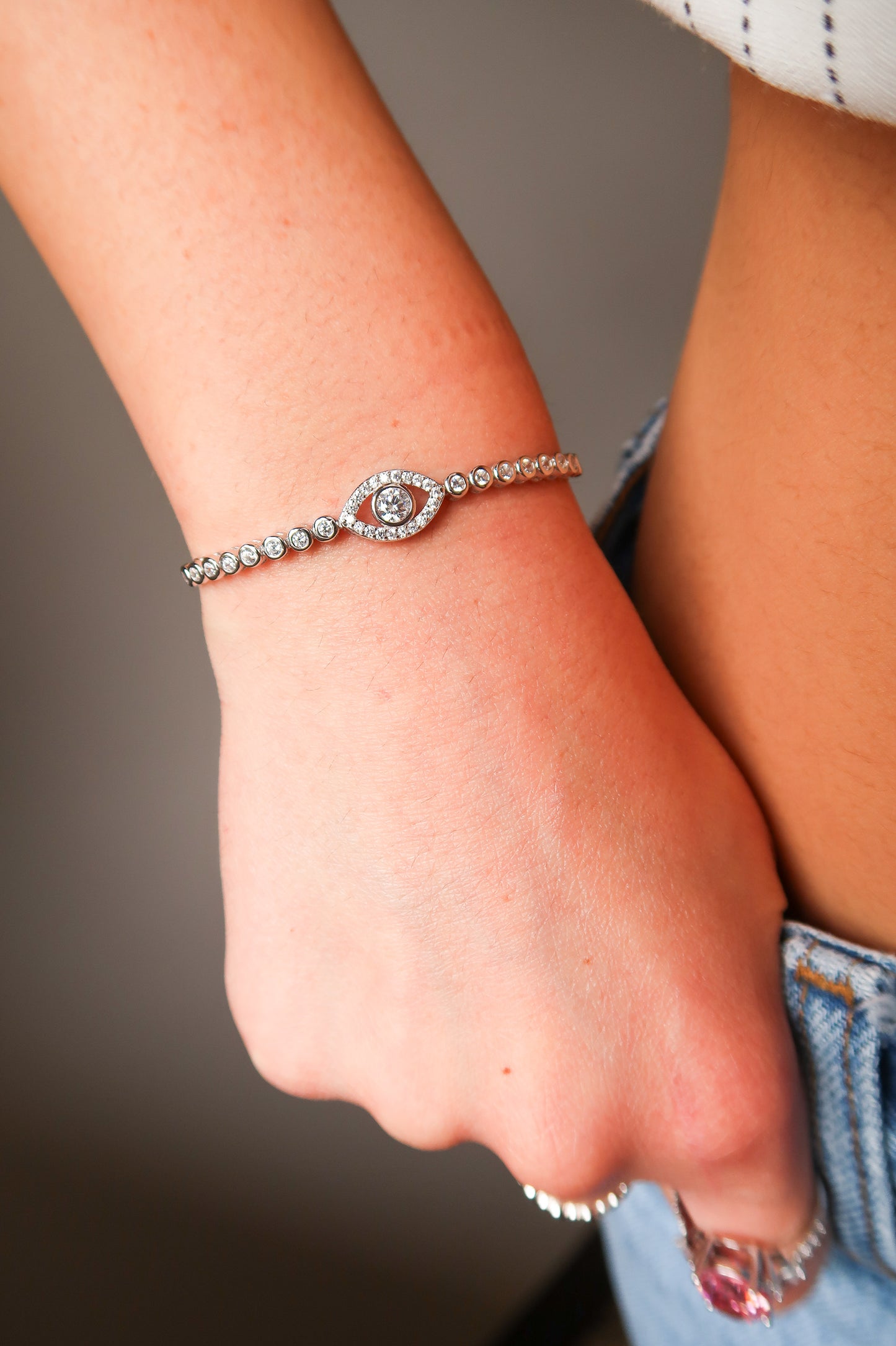 Nirvana .925 Sterling Silver Crystal Tennis Eye Bracelet