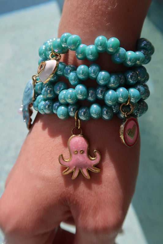 Sun &amp; Shell 4 Piece Pearlized Bracelet 4 piece Stack